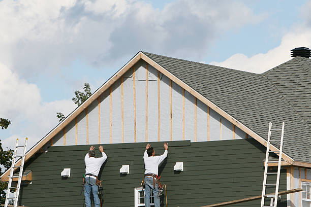 Professional Siding Contractor technician working in Adamsburg, PA